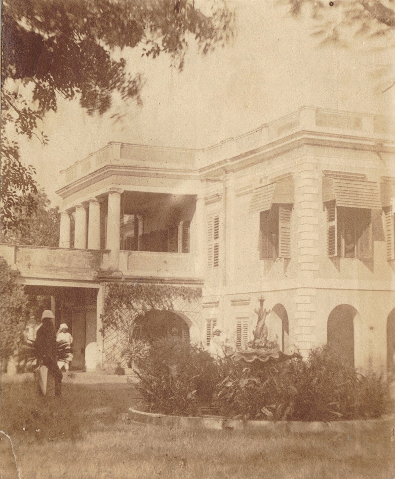 Church Mission House Madras India 1876 Rev John Barton in foreground William Mackworth Young and Emily Barton at windows.jpg